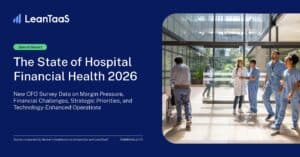 A hospital staff member pushes a patient in a wheelchair through a glass-walled corridor, accompanied by two other staff, next to a presentation slide titled “The State of Hospital Financial Health 2026.”.